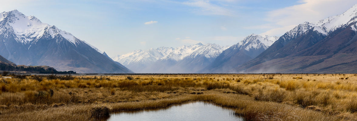 lake Ohau with snowy mountains in the background